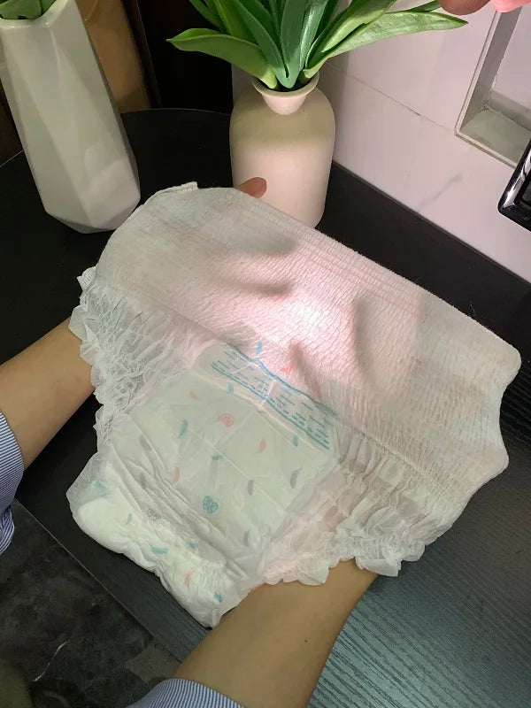Wholesale Factory Direct Adult Soft Breathable Disposable Women's Sanitary Pants Negative Ion Peace of Mind Pants